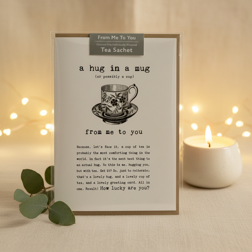 A Hug in a Mug greeting card with tea sachet – styled product image